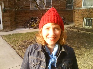 Cathy Turley wearing a red knitted hat 